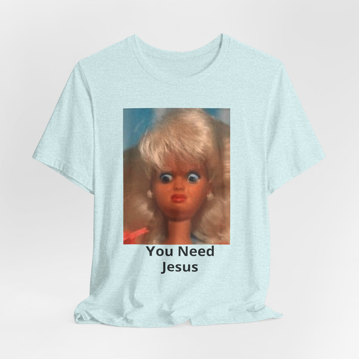 You Need Jesus Doll Tee — Funny Christian Graphic T-Shirt